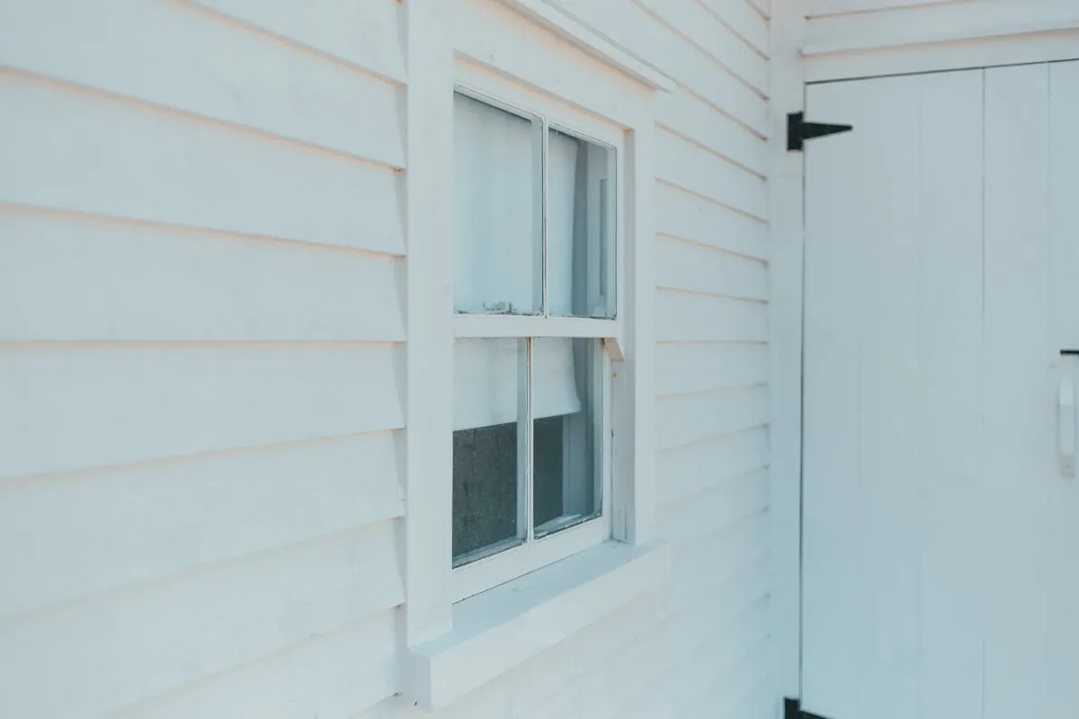 Pressure washing aluminum siding to remove oxidation and chalky residue